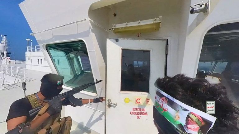 Houthi fighters on a ship in the Red Sea in November