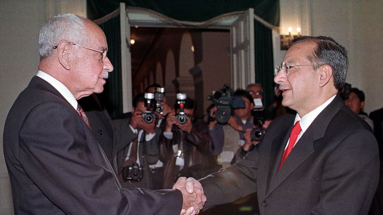 Bolivian President Hugo Banzer (L) with Victor Manuel Rocha in 2000