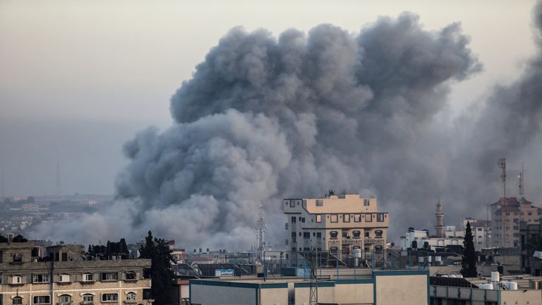 Thick smoke rises from buildings after an Israeli air strike on the city of Rafah in the southern Gaza Strip on 3 November. Pic: AP