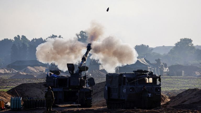 A mobile artillery unit fires in direction of Gaza Strip