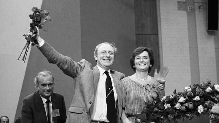 Neil Kinnock with his wife Glenys, acknowledging the applause which greeted the announcement of his victory in the Labour Party leadership election in Brighton. 
