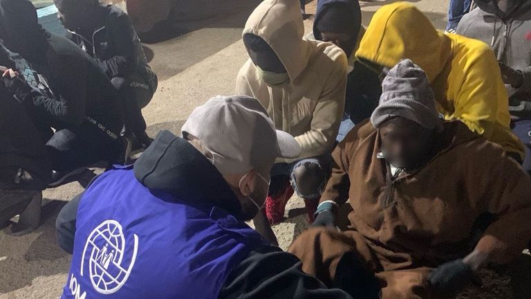 IOM staff look after the 25 migrants saved from shipwreck