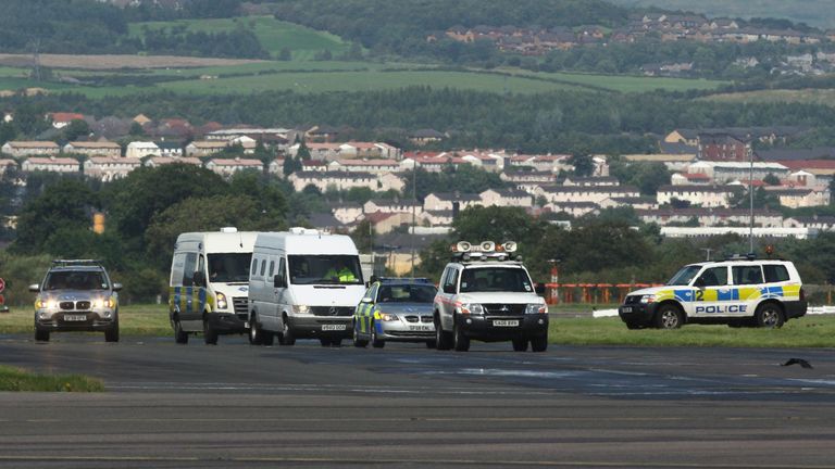 A convoy carrying Lockerbie bomber Abdelbaset Ali Mohmed Al Megrahi arrives at Glasgow Airport, for a plane bound for Tripoli, after he was released on compassionate grounds by Scottish Justice Secretary Kenny MacAskill.