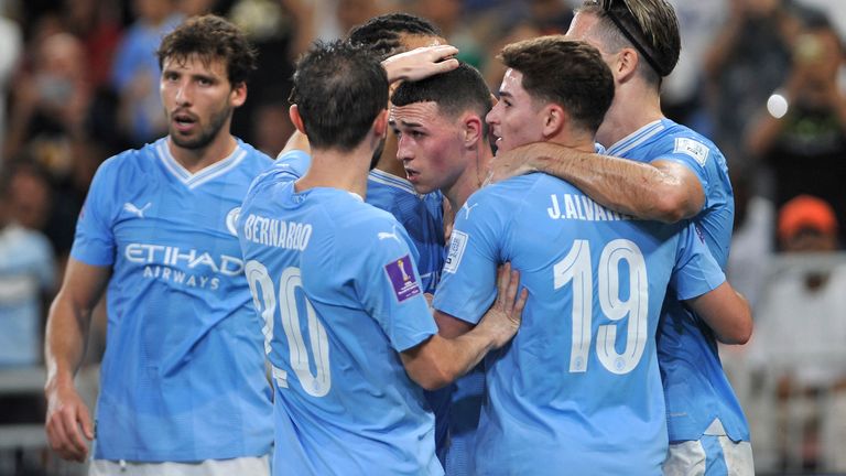 Manchester City&#39;s Phil Foden celebrates with teammates
