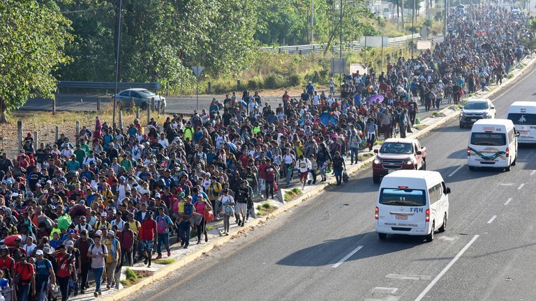 Migrants depart from Tapachula, Mexico, Sunday, Dec. 24, 2023. The caravan started the trek north through Mexico just days before U.S. Secretary of State Antony Blinken arrives in Mexico City to discuss new agreements to control the surge of migrants seeking entry into the United States. (AP Photo/Edgar H. Clemente)