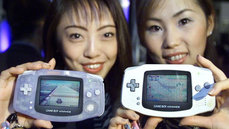 Nintendo promotion girls Ruriko Harada (L) and Jun Suzuki show off Game Boy Advance, a next-generation hand-held player, at a press preview in Tokyo March 7, 2001. Game Boy Advance, successor to the world&#39;s top-selling Game Boy portable player, uses a 32-bit processor, is Internet-enabled, and is due to hit stores in Japan on March 21 for 9,800 yen ($82.59). Sales in the United States, Europe, and Australia are set for June, Nintendo said. ES/PB