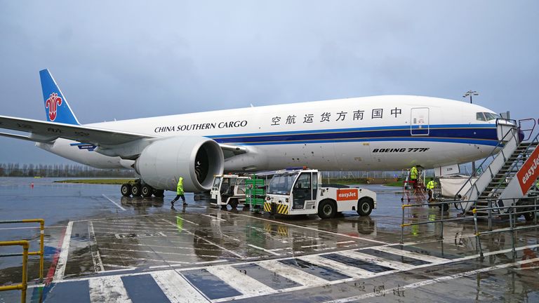 A plane on the runway at Edinburgh Airport ahead of giant pandas Yang Guang and Tian Tian beginning their journey back to China after spending 12 years at Edinburgh Zoo. They will each travel in a specially designed metal crate on the flight to China, accompanied by a keeper from Edinburgh Zoo and a Royal Zoological Society of Scotland vet. Picture date: Monday December 4, 2023.