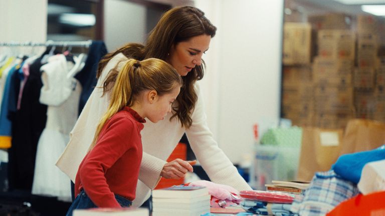 Princess Charlotte and her mother sort through children's pyjamas. Pic: Will Warr/Kensington Palace