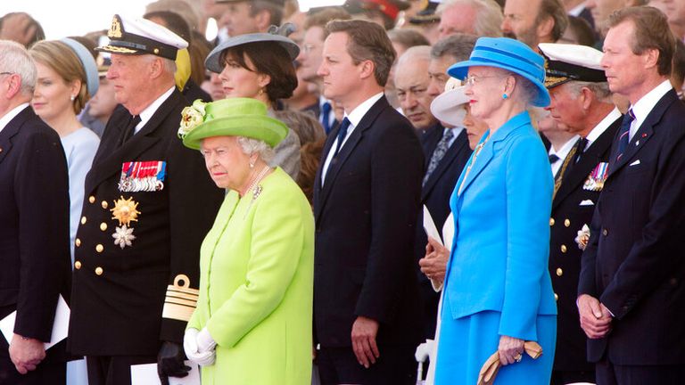 President of Italy Giorgio Napolitano (first row, L-R), Slovakian President Ivan Gasparovic, King Harald V. of Norway, Britain&#39;s Queen Elizabeth II., Queen Margrethe II. of Denmark and Henri Grand Duke of Luxembourg during the 70th anniversary of the D-Day landings, on Sword beach, Ouistreham, Normandy, France, 06 June 2014. Photo by: Patrick van Katwijk/picture-alliance/dpa/AP Images


