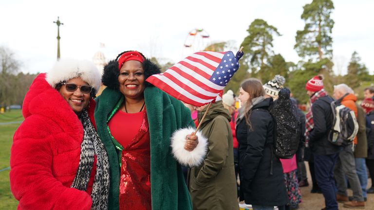 Royal fans Bronte Stewart (left) and Stephanie Abdullah, who have travelled from Washington DC, wait to greet the members of the royal family attending the Christmas Day morning church service at St Mary Magdalene Church in Sandringham, Norfolk 