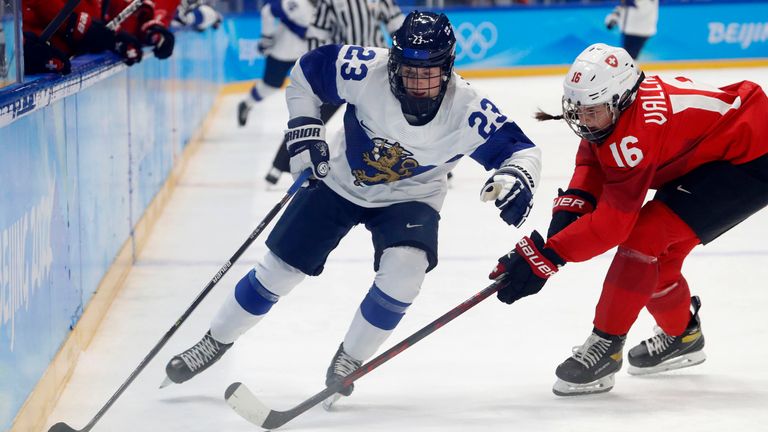 Sanni Hakala and Switzerland's Nicole Vallario during the Beijing 2022 Olympic Winter Games. Pic: AP