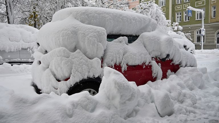02 December 2023, Bavaria, Munich: A thick layer of snow lies on parked cars. Snow and ice have caused chaos on the roads and on the railroads in southern Bavaria. Photo by: Katrin Requadt/picture-alliance/dpa/AP Images