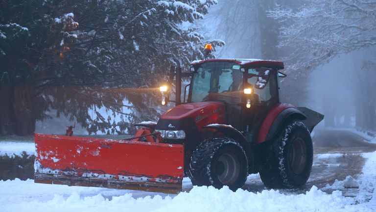 A snowplough clears a road in the village of Keele, Staffordshire, Britain, December 3, 2023. REUTERS/Carl Recine