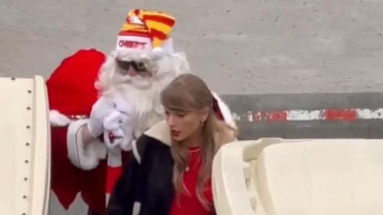 Taylor Swift rides in golf cart with Santa Claus at Kansas City Chiefs game, Ents & Arts News