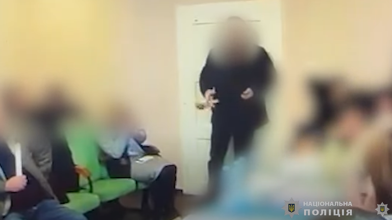 Video shows Ukrainian council member throw grenades at village meeting;  dozens injured