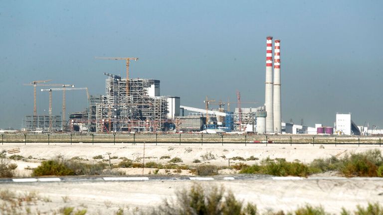 The coal-powered Hassyan power plant is seen under construction in Dubai, United Arab Emirates, Wednesday, Oct. 14, 2020. The planned $3.4 billion coal-fired power plant in Dubai instead will be converted to use natural gas, the sheikhdom announced Thursday, Feb. 3, 2022, amid the United Arab Emirates&#39; wider pledge to have net-zero carbon emissions by 2050. (AP Photo/Kamran Jebreili)