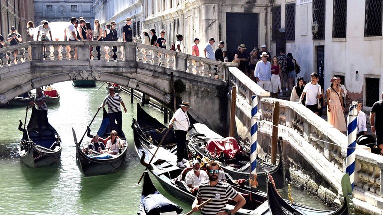 The canals of Venice are visited by millions of tourists each year. Pic: AP
