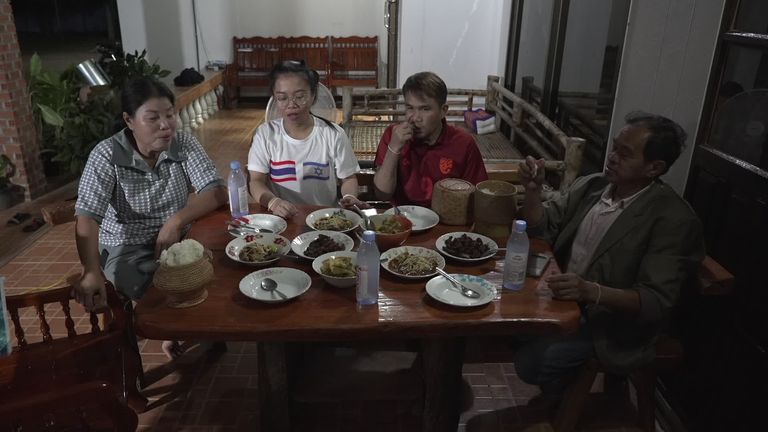 Yo Munkan and family enjoying a celebratory meal after being reunited 