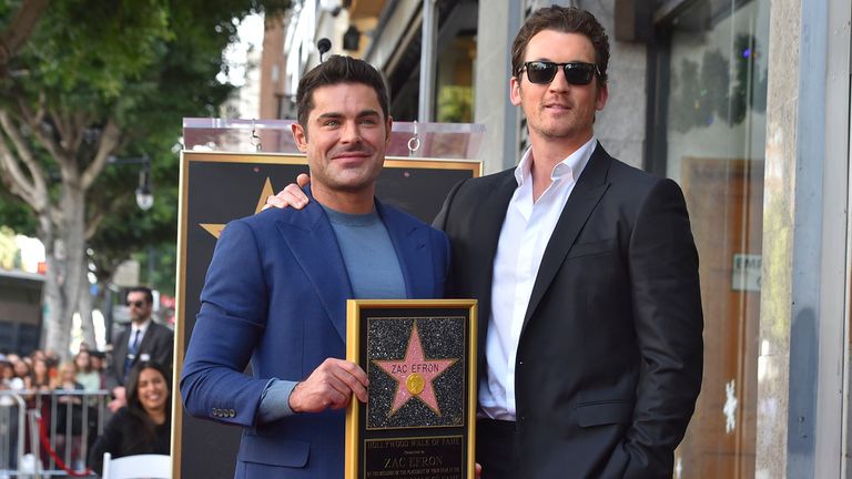 Zac Efron, left, and Miles Teller attend a ceremony honoring Efron with a star on the Hollywood Walk of Fame on Monday, Dec. 11, 2023, in Los Angeles. (Photo by Jordan Strauss/Invision/AP)