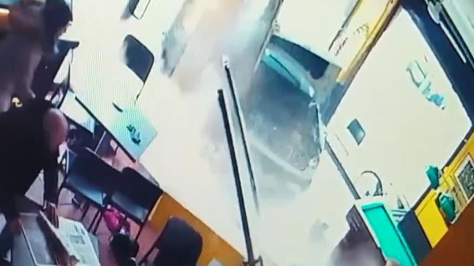 This dramatic CCTV footage shows the moment a car crashed into a cafe in  Turin, Italy.