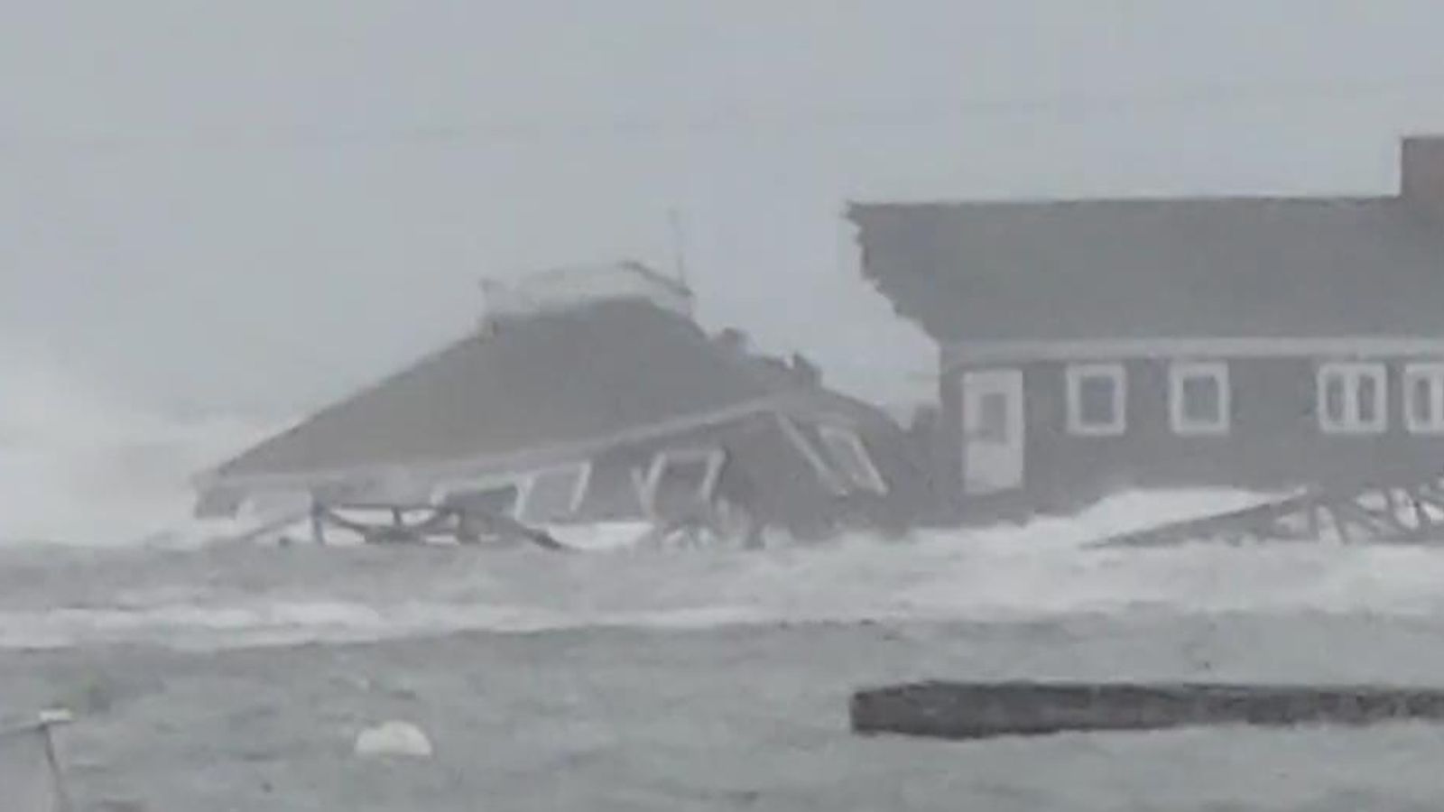 Watch: Part of building collapses, washes away during Maine storm