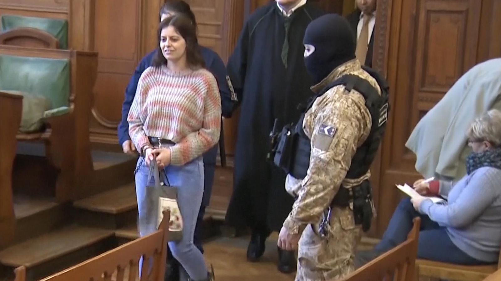 Hungary: Italian woman appears in court in chains to face assault ...