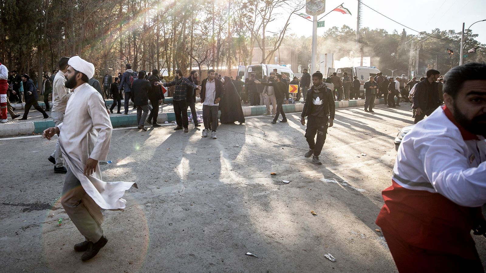 Iran vows revenge after more than 100 killed in blasts near tomb of former commander