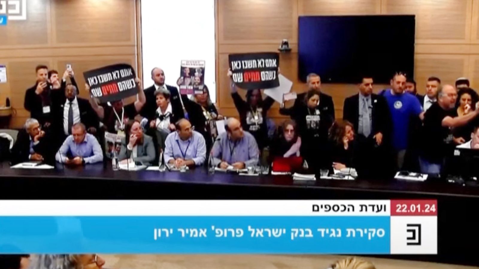 Relatives of Israeli hostages storm parliament to demand action