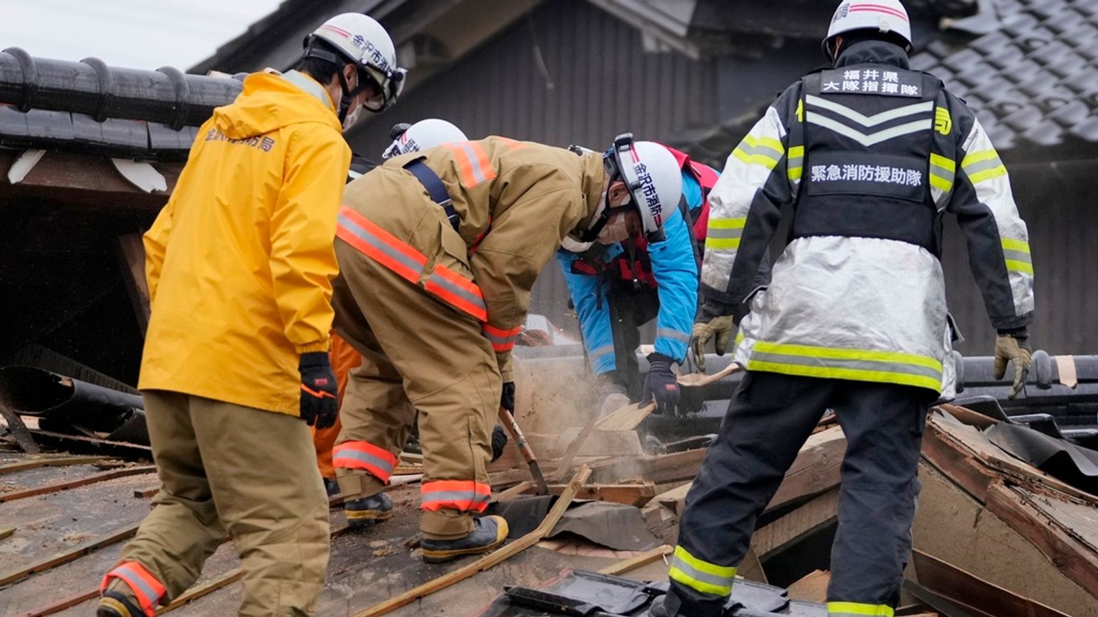 Rescue teams in Japan race against time to find earthquake survivors