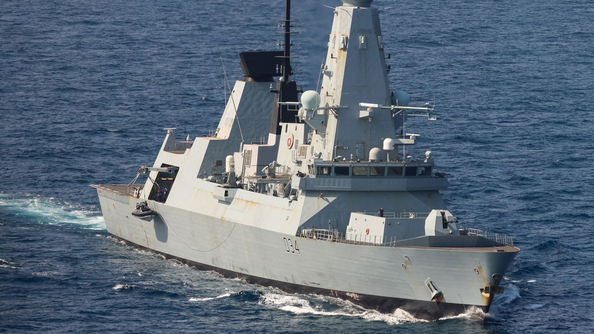 UK warship downs Houthi missile - as Palestinian officials say five killed in Israeli strikes