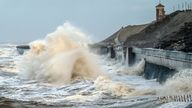 Waves break on the sea front in Blackpool
