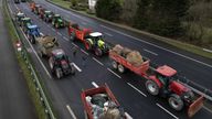 French farmers block the N12 road with their tractors to protest over price pressures, taxes and green regulation, grievances shared by farmers across Europe, in Plouisy near Guingamp, Brittany, France, January 24, 2024. REUTERS/Stephane Mahe
