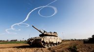 A tank stands near the border with the central Gaza, as the conflict continues between Israel and the Palestinian Islamist group Hamas, Israel January 22, 2024. REUTERS/Amir Cohen