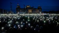People gather to protest against the AfD party and right-wing extremism in front of the Reichstag building in Berlin. Pic: AP