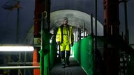 A worker walks at the construction site of a nuclear reactor at Hinkley Point C nuclear power station in Somerset, England, Tuesday, Oct. 11, 2022. Nuclear power is generated through fission, the process of splitting uranium atoms. The energy released by fission turns water into steam to spin a turbine that generates electricity, a process which doesn...t emit planet-warming gases into the atmosphere. Pic: AP