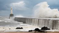 Waves Crashing on Breakwater with Lighthouse in Aberdeen Harbour

