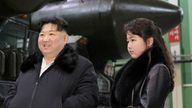 North Korea released a new picture of Kim Jong Un and his daughter visiting a military vehicle production plant on Friday