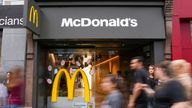People walk past McDonald&#39;s store in London, Britain July 27, 2022. REUTERS/Maja Smiejkowska