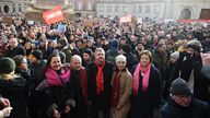 Olaf Scholz (second left) and foreign minister Annalena Baerbock (second right) at the protest in Potsdam. Pic: AP