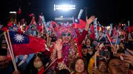 Supporters cheer during an election rally for Kuomintang (KMT) presidential candidate Hou Yu-ih in New Taipei City, Taiwan on Friday, Jan. 12, 2024 ahead of the presidential election on Saturday.(AP Photo/Louise Delmotte)