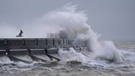 Waves crash against the breakwater at Brighton Marina in Brighton, East Sussex. A weather warning for wind has been issued for parts of England and Wales for New Year&#39;s Eve while revellers in other parts of the UK have been urged to pack a rain jacket for the countdown. Picture date: Sunday December 31, 2023.