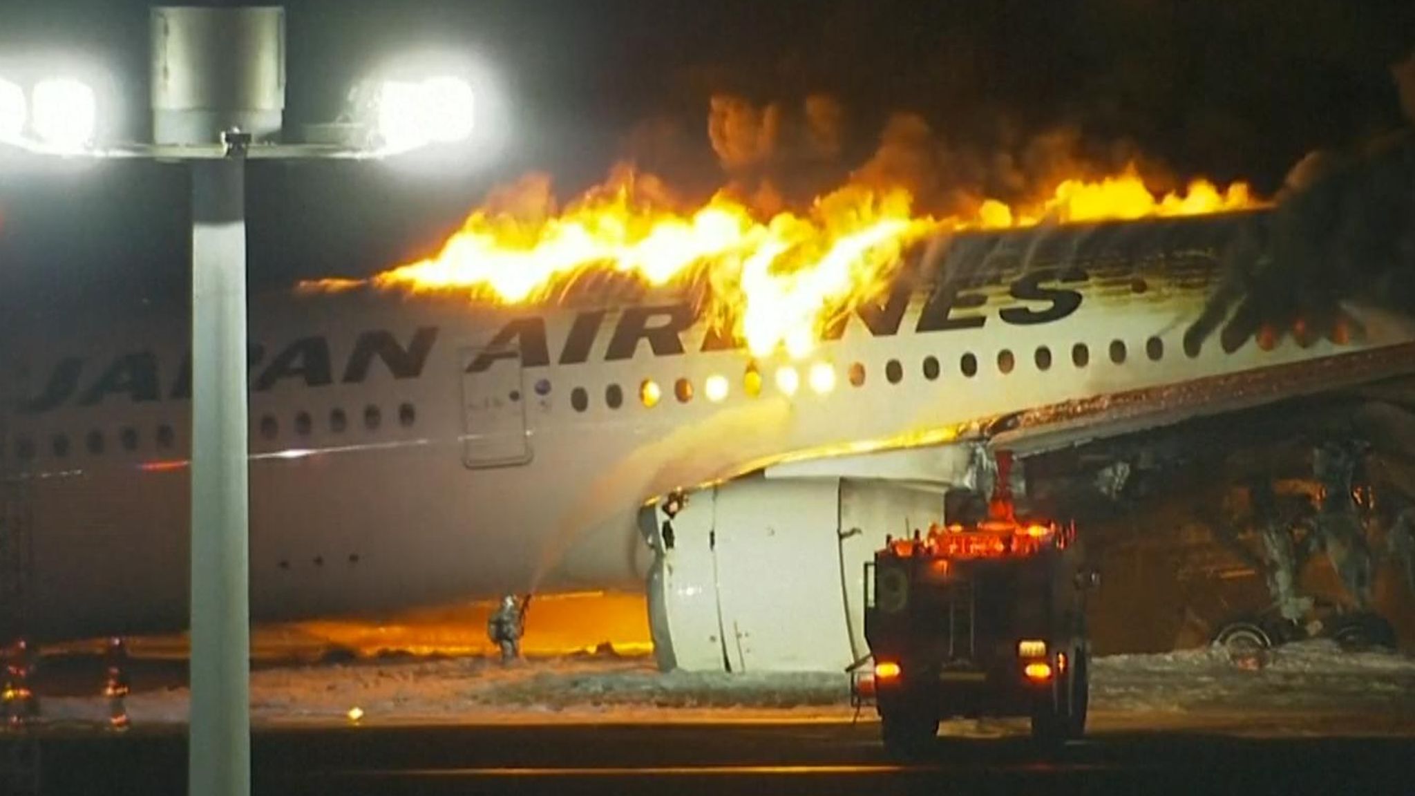 Hundreds of passengers escape after jet collides with small plane on ...