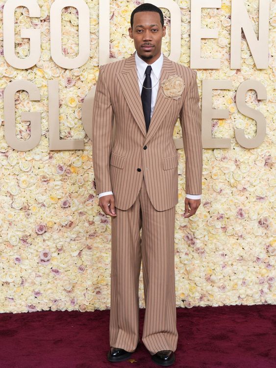 Tyler James Williams arrives at the 81st Golden Globe Awards on Sunday, Jan. 7, 2024, at the Beverly Hilton in Beverly Hills, Calif. (Photo by Jordan Strauss/Invision/AP)