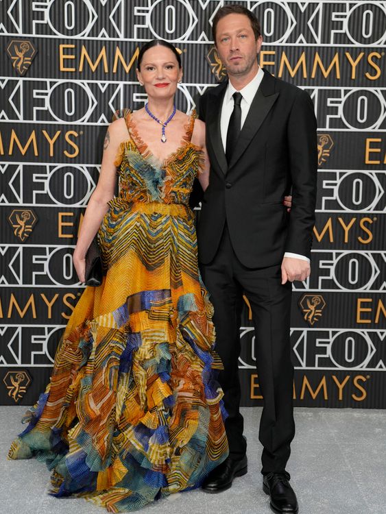 Yelena Yemchuk, Ebon Moss-Bachrach arrive at the 75th Primetime Emmy Awards on Monday, Jan. 15, 2024, at the Peacock Theater in Los Angeles. (AP Photo/Ashley Landis)