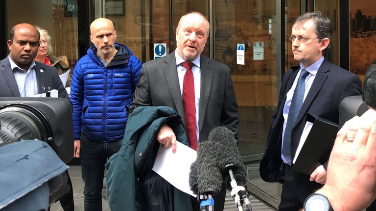 Lead claimant Alan Bates (centre) speaking outside the High Court in London, after the first judgment was handed down in claims against the Post Office over its computer system. Picture date: 15 March 2019