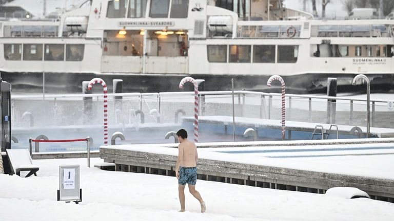 A man walks by the Allas Sea Pool, in Southern Helsinki, Finland, Tuesday, Jan. 2, 2024. Finland and Sweden have recorded this winter’s cold records on Tuesday as a temperatures plummeted to over minus 40 degrees as a result of a cold spell prevailing in the Nordic region. (Vesa Moilanen/Lehtikuva via AP)


