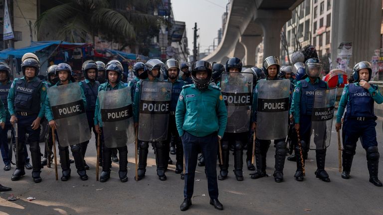 Bangladesh policemen stand guard outside Baitul Mukarram mosque for possible protests ahead of Sunday&#39;s parliamentary elections, in Dhaka, Bangladesh, Friday, Jan. 5, 2024. Bangladesh&#39;s main opposition party called for general strikes on the weekend of the country&#39;s parliamentary election, urging voters to join its boycott. This year, ballot stations are opening amid an increasingly polarized political culture led by two powerful women; current Prime Minister Sheikh Hasina and opposition leader and former premier Khaleda Zia. (AP Photo/Altaf Qadri)