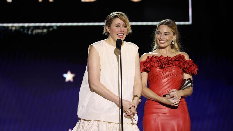 Greta Gerwig, left, and Margot Robbie receive the Best Comedy Award for Barbie