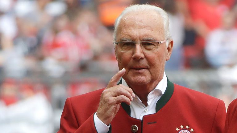 FILE - Bayern legend Franz Beckenbauer stands on the pitch prior to the German first division Bundesliga soccer match against SC Freiburg in Munich, Germany, on May 20, 2017. Germany&#39;s World Cup-winning coach Franz Beckenbauer has died. He was 78. Beckenbauer was one of German soccer&#39;s central figures. He captained West Germany to the World Cup title in 1974. He also coached the national side for its 1990 World Cup win against Argentina. (AP Photo/Matthias Schrader, File)