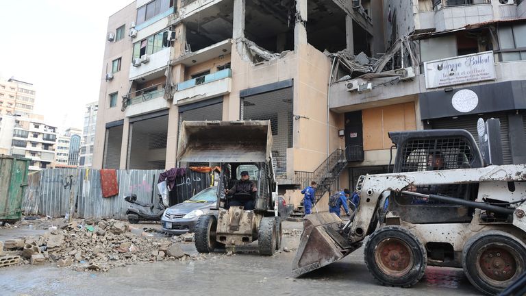 The rubble being cleared after the strike in Beirut&#39;s southern suburb of Dahiyeh